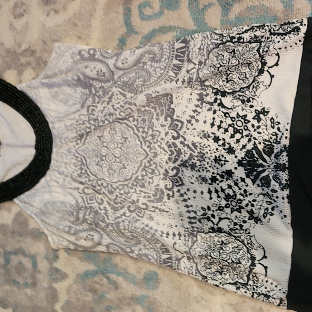 Designed tank top with beads at the top